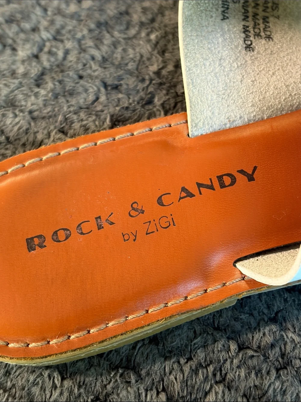 Rock & Candy White Strap Orange Footbed Toe-Post Sandals